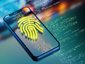 A smartphone displays a large digital fingerprint icon, symbolizing biometric security, with colorful coding lines in the background.