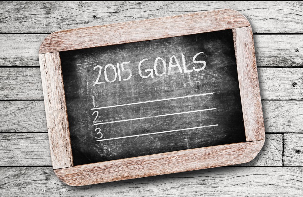 A blackboard with the word 2015 goals written on it.