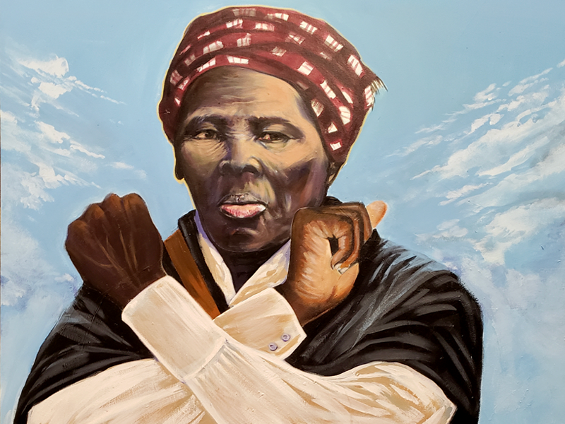 A painting of a black woman with a turban.
