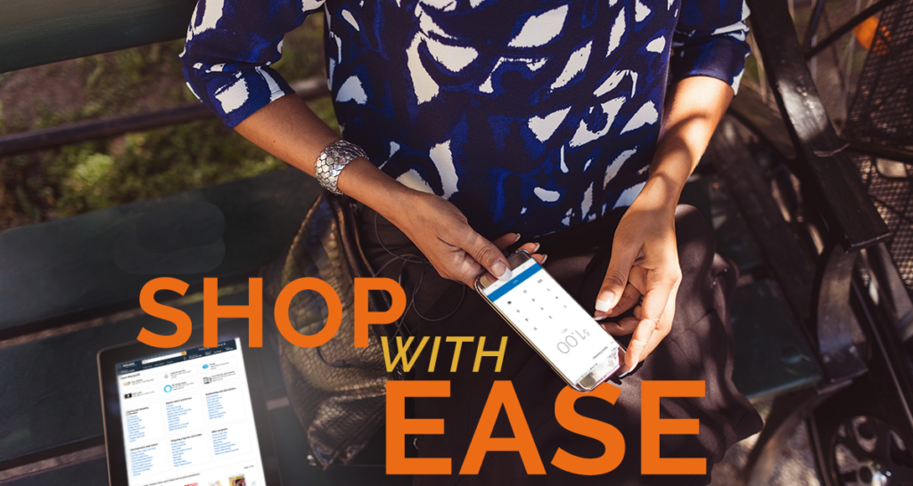 A woman holding a tablet with the words shop with ease.