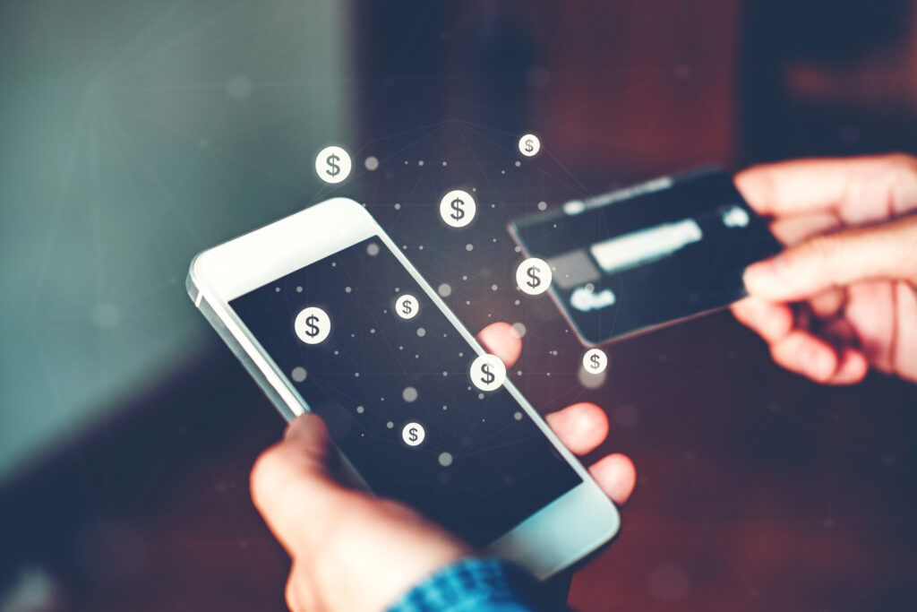 Online banking businessman using smartphone with credit card Fintech and Blockchain concept