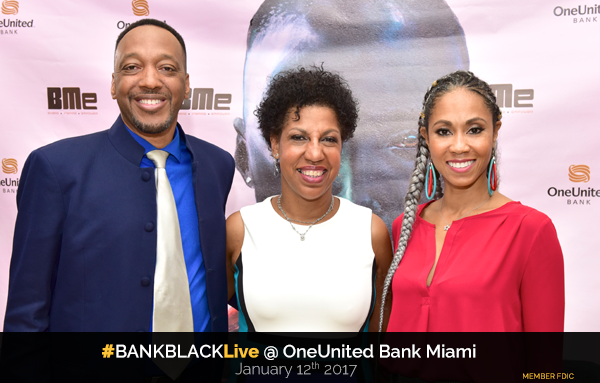 Three women posing for a photo at a bank black event.