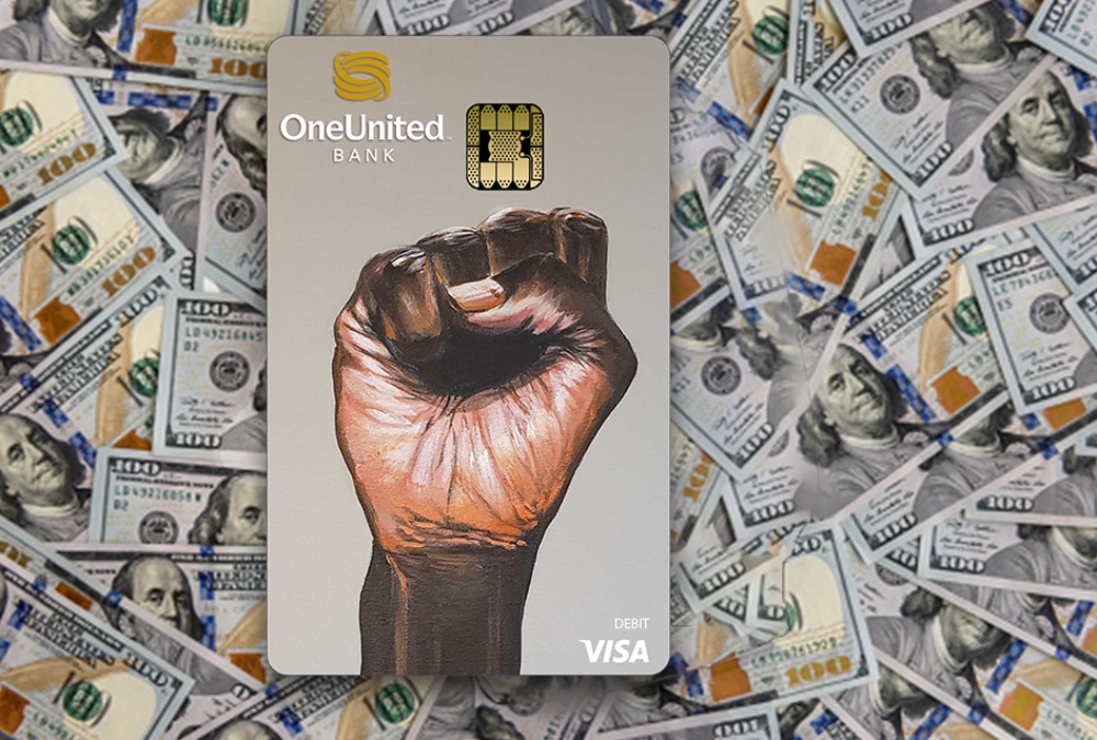 OneUnited Visa debit card with black fist illustration