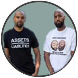Two men standing next to each other wearing t - shirts.