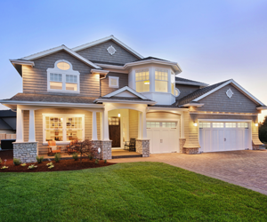 A beautiful home with a garage and driveway.