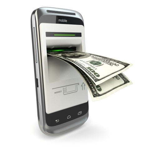 A mobile phone with money coming out of it.
