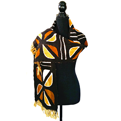 A black and orange scarf on a mannequin mannequin.