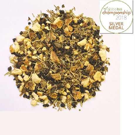 A mixture of dried herbs and spices on a white background.