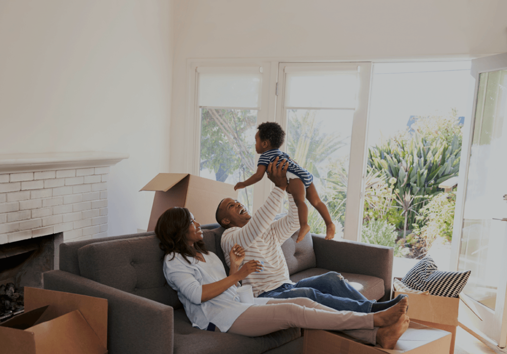 family playing in their new living room