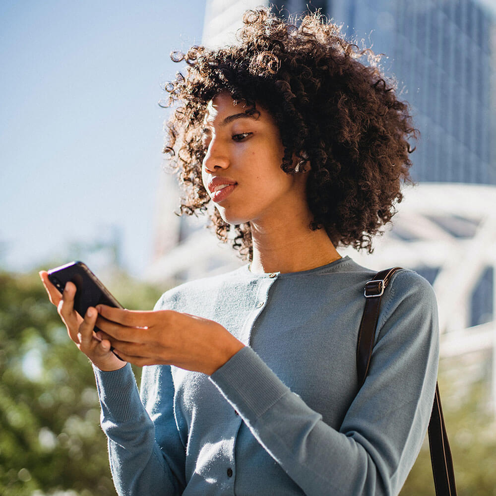 woman on phone outside