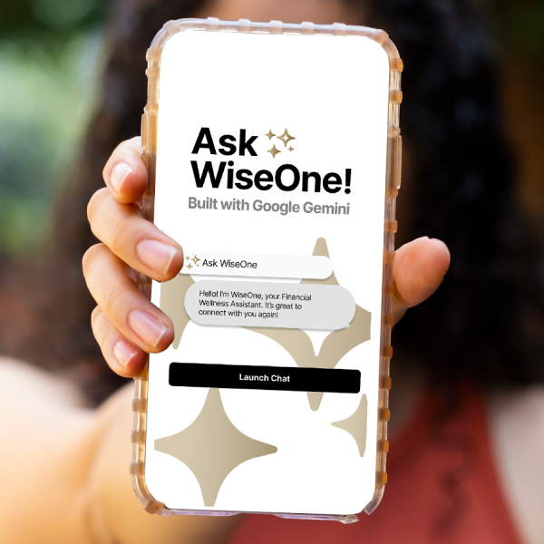 A person holds a smartphone displaying an app screen that reads "Ask WiseOne! Built with Google Gemini," with a chat message and a "Launch Chat" button visible.