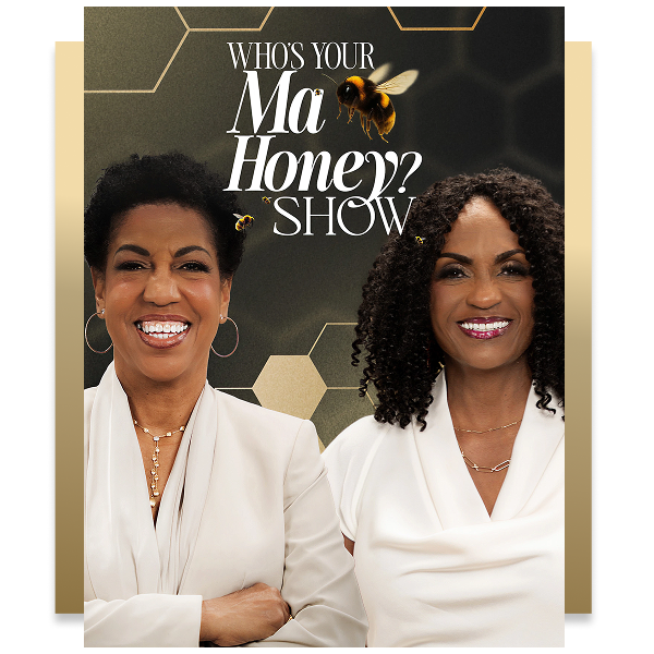 Two women in white tops stand smiling in front of a honeycomb-themed background with the text "Who's Your Ma Honey? Show" and images of bees.