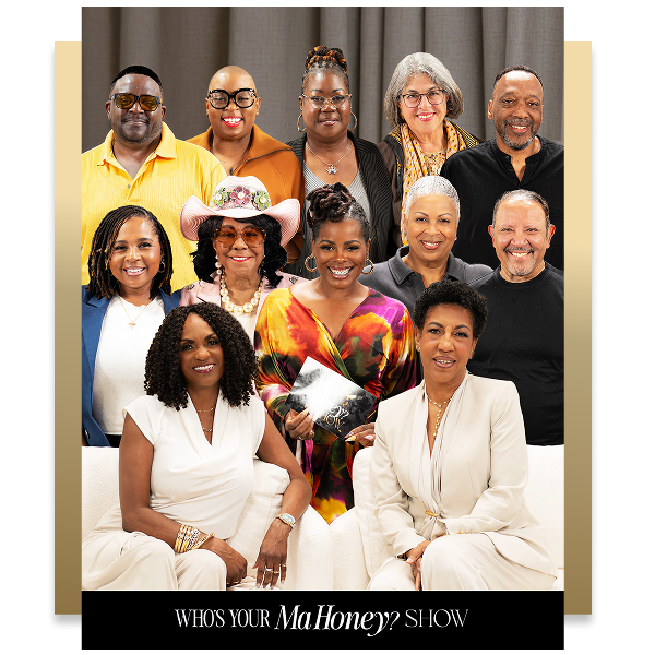 Fourteen adults, including men and women of varying ages, pose together in two rows for a group photo in front of a gray backdrop. Text at the bottom reads, "WHO'S YOUR MaHoney? SHOW.